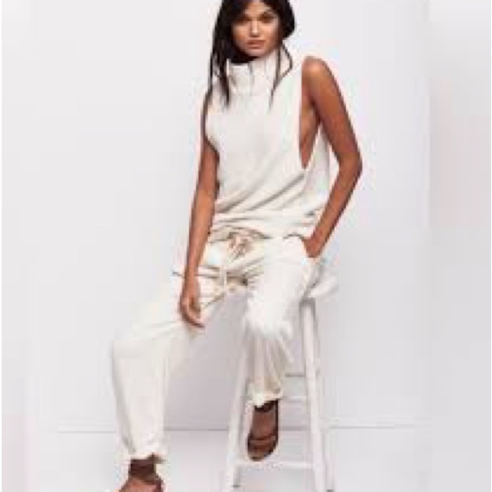 Cream Sleeveless Turtleneck Top